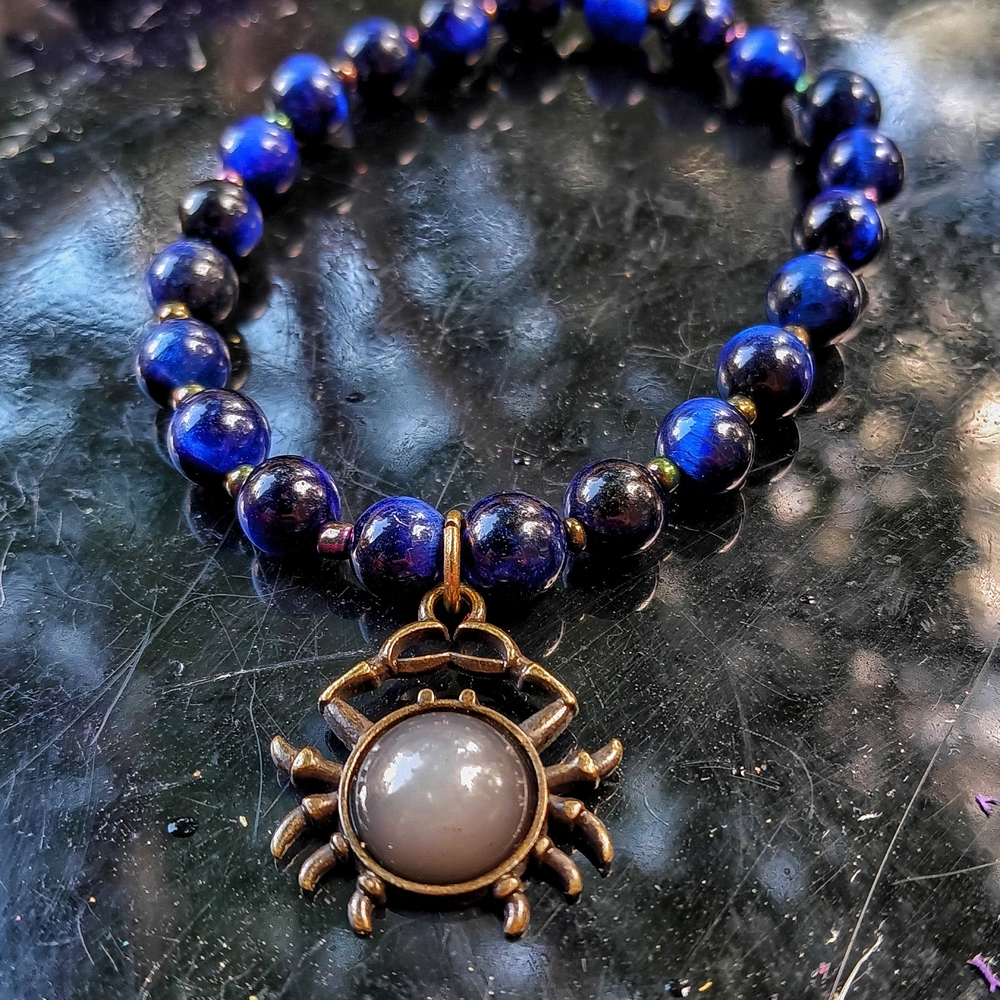 Blue and Gold Beaded Bracelet with Crab Pendant